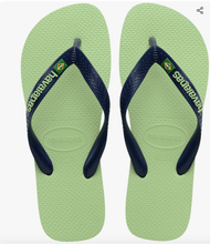 Load image into Gallery viewer, Havaianas pistachio green flip-flops with navy blue textured straps featuring bright green Havaianas branding and a small Brazilian flag emblem