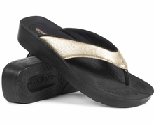 Load image into Gallery viewer, Black and gold flip-flops with 'Ora' branding on a white background