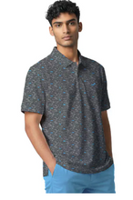 Load image into Gallery viewer, Man wearing a patterned polo shirt and blue shorts on a white background