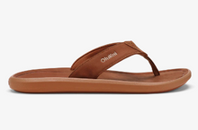 Load image into Gallery viewer, A brown OluKai Pili sandal with a cushioned footbed and a waterproof full-grain leather strap.