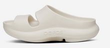 Load image into Gallery viewer, White slide sandal with 'Crocs' branding on a white background