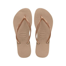 Load image into Gallery viewer, A pair of Havaianas flip-flops with metallic rose gold textured straps and rice grain patterned beige rubber soles showing the Havaianas logo and size 37-38