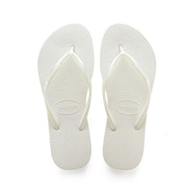 Load image into Gallery viewer, A pair of new white Havaianas flip-flops featuring textured soles and translucent straps with size 37-38 displayed on a bright white background