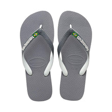 Load image into Gallery viewer, A pair of grey Havaianas flip-flops featuring textured soles, white straps, and the distinctive Havaianas logo with a colorful Brazilian flag emblem