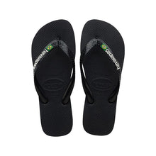 Load image into Gallery viewer, Product photography of a pair of black Havaianas flip-flops featuring white branding and a small Brazilian flag emblem on the strap and a textured sole