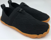 Load image into Gallery viewer, Black shoes with brown soles on a plain background

