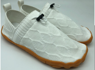 Load image into Gallery viewer, White slip-on shoes with brown soles on a light gray background
