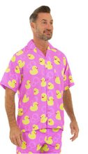 Load image into Gallery viewer, Man wearing a pink shirt with yellow rubber duck pattern on a white background
