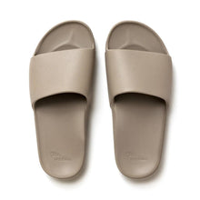 Load image into Gallery viewer, Pair of beige slides on a white background
