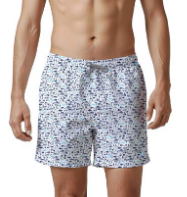 Load image into Gallery viewer, Man wearing patterned swim shorts on a white background
